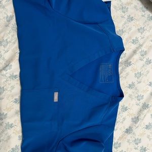 Figs scrub top size M